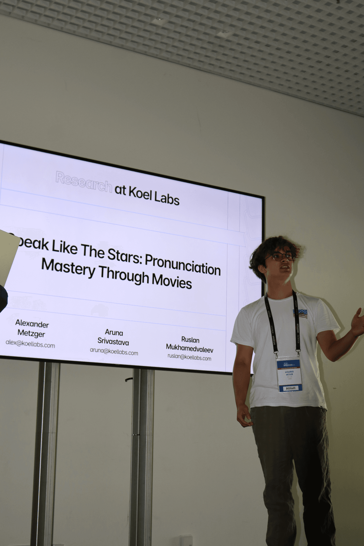 A photo of the Koel Labs founders, Alexander Metzger, Aruna Srivastava, and Ruslan Mukhamedvaleev standing in front of the bay bridge in San Francisco.